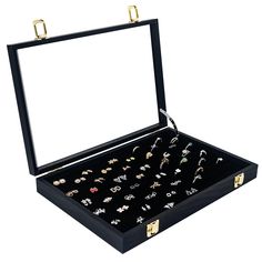 an open black box with several pairs of earrings in it