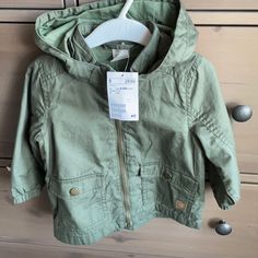 New With Tags! Absolutely Adorable H&M Baby Field Jacket. Size 6-9 Months But I Think It Could Easily Fit Up To 12 Months. Unisex. Detachable Hood. Cotton Outerwear With Adjustable Hood For Playtime, Casual Green Outerwear For Playtime, Green Outerwear For Playtime In Fall, Green Long Sleeve Outerwear For Playtime, Green Fall Outerwear For Playtime, Cotton Hooded Jacket For Playtime In Fall, Spring Hooded Outerwear For Playtime, Casual Outerwear With Adjustable Hood For Playtime, Spring Playtime Outerwear With Pockets