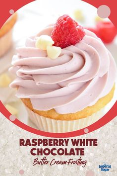 raspberry white chocolate buttercream frosting on top of a cupcake