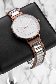 Double Date, one of a kind beauty. The dainty combination between the coffee & silver colors, with a special glossy finish look, a Swiss Ronda 706.1 mechanical movement, sapphire crystal glass, and a 316L stainless steel case all together creates an outstanding strong watch with a one of a kind beauty. #luxurywatches #swissmovement #classiclady #watchforher Line Of Life, Double Dates, Watch Trends, Ladies Watches, Mechanical Movement, The Coffee, Sapphire Crystal, Luxury Watches, Gold Watch