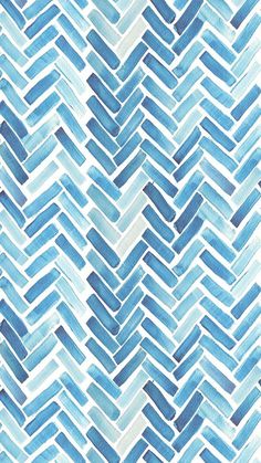 a blue and white watercolor herringbone pattern