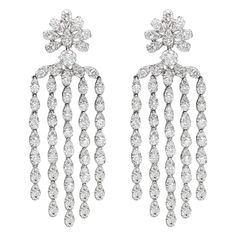 Very Impressive Sparkling Dangling Earrings A Real Chandelier Style All Natural Brilliant Diamonds ! Total Diamonds 6.37 carat G-VS-SI. Made of round diamonds set into pear shape settings 18k White Gold 18.50 grams Omega type back closure. Overall approx size 2' Inch long (50 mm) Made in Italy Appraisal & Fancy Gift Box Included Diamond Dangling Earrings, Gold Chandelier Earrings, Round Diamond Setting, Fancy Gifts, Diamond Dangle Earrings, Chandelier Style, Gold Chandelier, Dangling Earrings, Gold Earrings Dangle