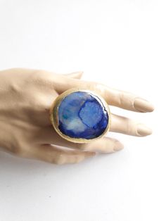 Statement Ring, Deep Blue Ring, Cobalt Blue Ring, Modern, Contemporary, Modernist, Resin, Big, Unique, Handmade, Artisan, KEEP IT AWAY FROM hair spray, nail polish remover, and other chemicals.  ADJUSTABLE FOR BIG SIZES Measure approx.: 4.3 cm x 3.7 cm = 1.7" x 1.5" All parts are handmade. --------- More Statement Rings here https://www.etsy.com/shop/ShimmeringCloud?ref=simple-shop-header-name&listing_id=1227403770§ion_id=33613562 Modern Blue Rings With Large Stone, Blue Large Stone Ring Jewelry, Handmade Unique Blue Crystal Ring, Handmade Blue Resin Rings, Unique Blue Resin Rings, Nail Polish Remover, Blue Rings, Deep Blue, Cobalt Blue