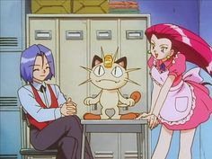 an anime character sitting at a table with a cat on it's head and another person standing next to her