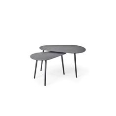 two tables sitting side by side on top of each other, one is grey and the other has black legs