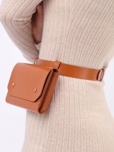 Handcrafted from smooth Italian leather, the Envelope Belt Bag will easily complete any outfit. A mix of style and practicability, the piece can be worn with a bodycon dress or oversized blazer for a chic look. With a modern and minimalist aesthetic, the adjustable belt allows for a customized fit while the slim envelope bag comfortably sits around the waist. Generous in size, it can securely hold your phone, wallet or other essential items. Waist Bag Size: Height- 11 cm, Width- 17.5 cm, Depth – Diy Leather Belt Bag, Belt Bag Diy, Diy Leather Belt, Harness Bag, Dog Accesories, Double Belt, Micro Bag, Leather Belt Bag, Leather Harness