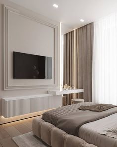 a bedroom with a large flat screen tv mounted on the wall