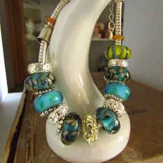 Fun Multicolor Glass Beaded Bracelet With Stunning Beads!!! Blues, Greens, Silver, Gold, Rhinestones, Silver Spacers, Lobster Clasp, 7" End To End. New Without Tags. We Are Offering Many Bracelets In This Same Style All With Completely Unique Beading On Each One. Get A 15% Discount On Bundle Of 2 Or More Special Discount Pricing On Most Items We Have An Eclectic Mix Of Vintage (And Some New) Items You Will Love, Check Out My Whole Closet And Follow Me! Thank You So Much Silver Glass Beaded Bracelets With Large Beads, Silver Glass Bracelets With Large Beads, Silver Bracelet With Colorful Glass Beads, Silver Glass Beaded Bracelets With Spacer Beads, Silver Czech Glass Large Beads, Large Silver Czech Glass Beads, Glass Beaded Bracelet, Glass Beaded Bracelets, Same Style