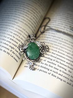 "Beautifully handmade jade pendent in 925 silver. Vintage sterling silver handmade pendent with over shape jade.  Length of pendent 2.5\"	in stock	118.00 USD	"	0.00 USD	Jewelry > Necklaces > Pendant Necklaces
"	sellers_with_a_sale	false	https://www.etsy.com/listing/1294091197/ghunghroo-silver-bangles-925-silver	adult	etsy://listing/1294091197?ref=applinks_android	Sarjanjewelers	Silver	new	en-US	"	true	unisex	0.69	Apparel & Accessories > Jewelry > Bracelets	https://i.etsystatic.com/18392446/r/il/ Handmade Oval Jade Necklaces, Elegant Silver Aventurine Jewelry, Elegant Handmade Aventurine Necklaces, Jade Jewelry With Large Pendant As A Gift, Silver Aventurine Jewelry As A Gift, Handmade Oval Jade Jewelry, Handmade Elegant Aventurine Necklace, Antique Jade Jewelry As A Gift, Handmade Silver Aventurine Jewelry