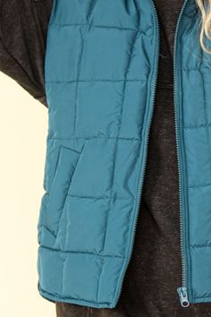 This stylish and practical vest in blue features a high neck for extra warmth and a zip-up front for easy wear. Side pockets keep essentials handy, while the side slits allow for comfortable movement. Ideal for layering, it combines functionality with a sleek, insulated design. Material composition: 100% polyesterProduct measurements: S:Bust 35-36 in, Waist 27-28 in M:Bust 37-38 in, Waist 29-30 in L:Bust 39.5-41 in, Waist 31.5-33 in Winter Vest With Zipper Closure For Outdoor Activities, Winter Functional Vest With Side Pockets, Functional Outdoor Vest With Zipper Closure, Functional Winter Vest With Side Pockets, Sporty Winter Vest For Layering, Sleeveless Outerwear With Zipper Closure, Winter Outdoor Vest With Side Pockets, Winter Vest With Side Pockets For Outdoor, Functional Vest With Pockets For Cold Weather