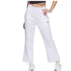 Adidas Xpress Flare Pants New With Tags Regular Fit Flare Leg Wide Leg Cropped Ankle Length Pleated White, Black Women’s Size Large Fit & Design Regular Fit Elastic Waist With Drawstring Kick Flare Wide Leg 7/8” Length Stretch Front Slash Pockets Polyester, Cotton, Spandex Ships Next Day! Approximate Measurements 16” Across Waist (Unstretched) 26” Inseam Style Profile: Athletic, Comfy, Active, Workout, Travel, Sustainable, Track, Cropped Joggers, Sweatpants, Activewear, Comfy, Trendy, Casual, St Adidas Sporty Wide Leg Sweatpants, Adidas Sporty Wide Leg Pants, Adidas Sporty Wide-leg Pants, Adidas Sporty Wide Leg Bottoms, Adidas Sporty Wide-leg Bottoms, Adidas Stretch Sweatpants For Spring, Adidas Full Length Athleisure Bottoms, Adidas White Sportswear Bottoms, Sporty High-waisted Pants