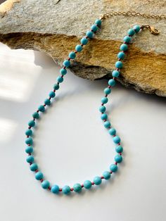 Beautiful Turquoise Knotted necklace. -6mm Turquoise beads. -Gold plated findings. Turquoise Single Strand Beaded Bohemian Necklace, Hand-strung Turquoise Beaded Necklaces With Round Beads, Turquoise Single Strand Amazonite Necklace, Handmade Turquoise Amazonite Necklace, Turquoise Single Strand Beaded Necklace In Bohemian Style, Turquoise Single Strand Necklace In Amazonite, Turquoise Amazonite Single Strand Necklace, Spiritual Single Strand Turquoise Beaded Necklace, Bohemian Amazonite Single Strand Beaded Necklace