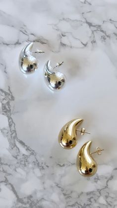 Add some glam to your earring collection with our Silver Plated Drop Earrings! Lightweight on the ear and a fun twist on the classic gold hoop, a perfect statement piece. They are great for everyday wear, wedding, festival, or enjoying a GNO! Non-tarnish, water resistant. Made in Italy. Will ship 9/28. Lightweight 1/2" wide x 1" long Yellow Gold Sterling Silver Drop Earrings, Silver Teardrop Hoop Earrings In 14k Gold, Silver 14k Gold Teardrop Hoop Earrings, Luxury Teardrop Hoop Earrings In Sterling Silver, White Gold Teardrop Earrings With Shiny Finish, Anniversary Teardrop Earrings With Shiny Finish, Teardrop Hoop Earrings With Shiny Finish As Gift, Silver 14k Gold Drop Earrings, Yellow Gold Drop Hoop Earrings In Sterling Silver