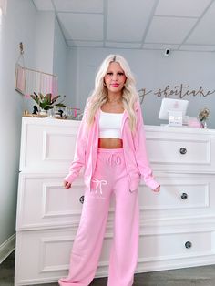 We are so excited to release our newest merch item! The Sassy Bow Sweatpants in Bubblegum pink feature a white bow and the text Sassy Shortcake. These wide leg sweats feature an elastic waistband and pockets for maximum comfort, and feature a soft micro-fleece lining. Rep your favorite brand in these super cute pants!! Also available in blue and gray. Wear it as a set! Pair it with the matching bubblegum pink bow zip up. fits: true to size, model wearing a size small content: 100% polyester care Trendy Pink Sweatpants For Lounging, Pink Relaxed Fit Sweatpants For Lounging, Pink Athleisure Sweatpants For Lounging, Casual Pink Sweatpants For Loungewear, Sporty Pink Loungewear Pants, Sporty Pink Lounge Pants, Casual Pink Sweatpants For Pajama Party, Casual Pink Sweatpants For Pajamas, Trendy Pink Relaxed Fit Sweatpants