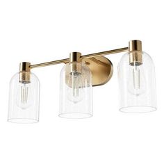 three light brass bathroom fixture with clear glass shades