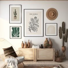 a living room filled with furniture and pictures on the wall next to a table topped with vases