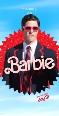 a man in a suit and tie with the words barbie on his chest, wearing pink sunglasses