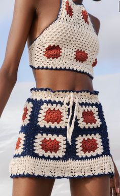 Granny square mini skirt and crop top.  This crochet set includes a granny square mini skirt and a cross back crop top. Possible to use together as a set or seperately with your other top and bottom combinations. These items will be your great choice of your summer days, festival and concert activities or as a street style.  -Hand knitted -Free shipping to worldwide -%55 cotton, %45 acrylic high quality yarn - custom order: will be ready to ship within 1-2 weeks after your order. - hand wash Granny Square Skirt, Square Skirt, Skirt And Crop Top, Mode Crochet, Crochet Skirts, Crochet Tops Free Patterns, Crochet Fashion Patterns, Crochet Set, Crochet Skirt