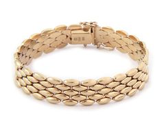 Hallmark: 585t Italy   Material:  14k yellow gold Measurement:  7.5" long x 0.55" wide x 0.11" high Weight:  29.9 grams This is an elegant Estate bracelet, crafted from 14k yellow gold featuring 5 rows with marquise shape links on a 13mm wide flex band. It secure with a push in clasp and has a latch for added security. The clasp has the 585 gold content stamp. 26244 Wedding Jewelry Bracelets, Wedding Bracelets, Ruby Diamond, Wedding Bracelet, Tennis Bracelet, Gold Stars, Bracelet Making, Diamond Bracelet, The Row