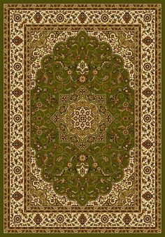 a green rug with an ornate design on it