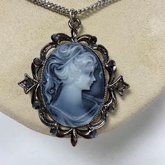 "m264 Vintage Sterling Silver Chain Necklace 30\" Silver Tone Carved Cameo Pendant PLEASE READ ENTIRE DESCRIPTION BEFORE PURCHASING Vintage Sterling Silver (stamped) Chain Necklace. 30\" long. Silver Tone Pendant. Carved Cameo, framed with dark silver tone/dark grey stones. Approx. measurements chain 30\" x 2mm wide. Pendant 2\" x 1.75\" x .25\" Pre-owned vintage item. Great condition for it's age. Partial discoloration. Sold as is, as seen on pictures, no returns on vintage/antique items. We do Ethereal Essence, Medieval Jewelry, Cottagecore Decor, Cameo Jewelry, Soft Classic, Sterling Silver Chain Necklace, Cameo Pendant, Key Pendant, Silver Chain Necklace