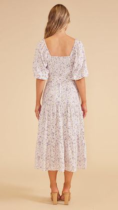 The Hailey Midi Dress is a dreamy, romantic style with soft, elbow-length puff sleeves, a sweetheart neckline, gathered bust and waist cut-out. Style Number: MG2301652 - Soft voluminous sleeves - Sweetheart neckline - Gathered bust with self-covered O-ring detail - Tiered skirt - Shirred back panel - Invisible back zipper - Midi length - Size up for a better fit. Made small. - Designed in Sydney, Australia Jordan is 178cm tall (5'10") tall and wears size S. - MAIN: 90% VISCOSE 10% POLYAMIDE- LIN Feminine Voluminous Puff Sleeve Dress With Balloon Sleeves, Spring Square Neck Puff Sleeve Dress With Voluminous Fit, Puff Balloon Sleeve Dress For Garden Party, Feminine Puff Bishop Sleeve Dress For Brunch, Feminine Puff Sleeve Dress With Voluminous Skirt, Spring Brunch Voluminous Puff Sleeve Dress, Voluminous Puff Sleeve Dress For Spring Brunch, Puff Sleeve Dress With Lantern Sleeves For Garden Party, Feminine Puff Sleeve Dress With Gathered Neckline