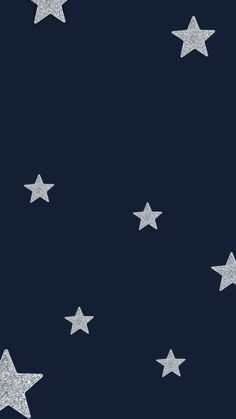 stars on a dark blue background with silver glitter