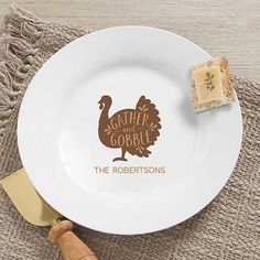 a white plate with the words gather gobble on it