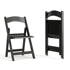 a black folding chair next to an empty wooden chair