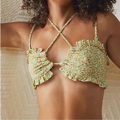 Ivory Combo This Sweet Bandeau Bra Features A Ruched, Ruffle-Adorned Silhouette With Front Keyhole Detailing And Smocked Back Band For Effortless Ease. Also Features Adjustable/Removable Straps! 100% Rayon Green Halter Top With Built-in Bra For Summer, Green Bandeau Halter Top For Summer, Orange Halter Top For Spring Beach Occasions, Orange Halter Top For Beach In Spring, Green Halter Top With Built-in Bra For Beach Season, Spring Bandeau Halter Top For Poolside, Bandeau Halter Top For Poolside Spring, Bandeau Halter Top For Spring Poolside, Spring Poolside Bandeau Halter Top