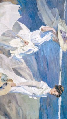 two women in white dresses are flying through the air