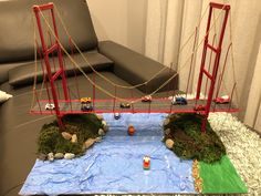 a model of a bridge with cars on it