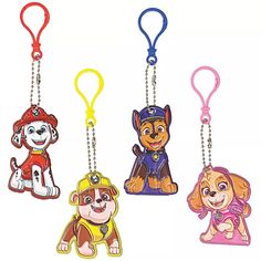 four key chains with cartoon dogs and fire fighters on them, all in different colors