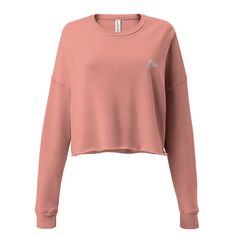 Did you know that fashion and comfort can be combined? This fleece crop sweatshirt is here to prove the point. The soft fabric feels extra soft to the touch, and the trendy cut with a ribbed neckline and raw hem comes right out of fashion magazines while still keeping it casual. * 52% airlume combed and ring-spun cotton, 48% poly fleece * Fabric weight: 6.5 oz/yd² (220.39 g/m²) * Ribbed crew neckline and cuffs * Dropped shoulder cut * Cropped body with a raw hem * Side-seamed * Blank product sou Cropped Cotton Sweater With Ribbed Collar, Relaxed Fit Cropped Crew Sweater, Fall Crew Neck Cropped Sweater With Ribbed Waistband, Sporty Cropped Long Sleeve Sweater For Loungewear, Sporty Long Sleeve Cropped Sweater For Loungewear, Fall Cropped Crew Neck Sweater With Ribbed Waistband, Sporty Cropped Sweater For Loungewear, Casual Cropped Crew Sweater With Ribbed Cuffs, Crew Neck Cropped Sweater With Ribbed Waistband For Fall