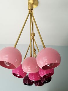 a pink chandelier hanging from the ceiling