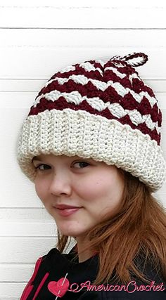 a young woman wearing a knitted hat