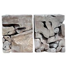 two pieces of art made out of rocks and wood are shown on a white background