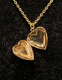 Necklace is gold in color Measures 18 inches in length Locket measures 1 inch in length and width Double Heart Rose Gold-plated Necklace, Valentine's Day Rose Gold Heart Necklace, Dainty Rose Gold Heart Locket Necklace, Gold Heart Locket Necklace For Formal Occasions, Dainty Rose Gold Locket Necklace For Valentine's Day, Rose Gold Necklace For Valentine's Day Keepsake, Elegant Rose Gold Locket Necklace For Valentine's Day, Valentine's Day Rose Gold Elegant Locket Necklace, Rose Gold Heart Charm Necklace As Keepsake