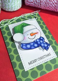 a christmas card with a snowman on it