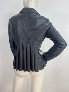 "iD Browns leather jacket, black leather jacket, size medium  Measurements:  Shoulder 17\"-18\"/sleeve 24\"/bust (pit-pit)18.5\"/waist 16\"/length 21\"/bottom width 19\"-21\" Mannequin measurements:  5'8\", bust 34\", waist 25\", hip 33\" Please note that vintage clothing sizes can vary greatly.  The Measurements provided  are approximate and are taken lying flat.  I suggest taking a similar garment from your wardrobe and measure it while lying flat.  This way you can compare measurements.  All Fitted Biker Blazer For Fall, Fitted Black Leather Jacket With Long Sleeves, Black Fitted Leather Jacket With Long Sleeves, Fitted Black Leather Jacket For Spring, Fitted Black Leather Jacket, Fitted Biker Leather Jacket For Formal Occasions, Fitted Leather Biker Jacket For Formal Occasions, Fitted Leather Blazer With Long Sleeves, Black Leather Blazer With Long Sleeves