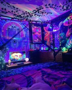 a bedroom with purple and blue lights on the walls