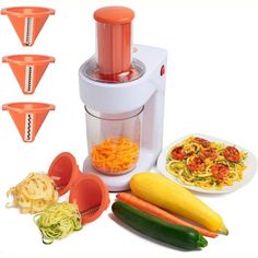 the food processor is full of pasta, vegetables and other things to make it into a meal