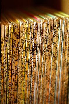 many books with graffiti written on them