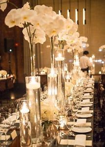 Amazing Wedding Centerpieces, Tall Glass Vases, Flowers And Candles, Orchid Centerpieces, Tall Wedding Centerpieces, Wedding Reception Ideas, Winter Wedding Flowers, Orchid Wedding, Spring Wedding Flowers