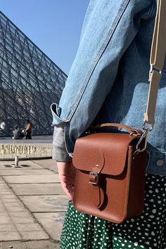 Image of summer city break outfit idea with denim jacket and crossbody brown leather bag - The Binocular Bag in Bay Celtic Grain from The Cambridge Satchel Co. Autumn Adventures, Adventure Bags, Color Complement