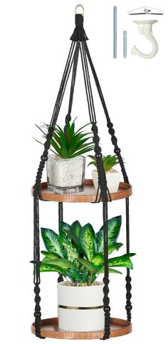 three tiered plant stand with potted plants on top and hanging from the ceiling