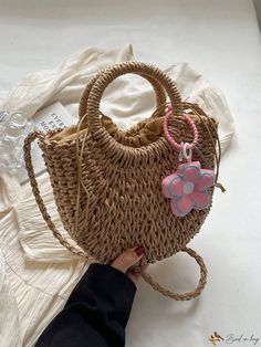 Bird in Bag - Exquisite Korean-Inspired Hand-Woven Straw Bag with Elegant Pendant - Perfect for Chic Women to Shop and Carry with Convenient Drawstring Closure Daily Use Woven Bag With Adjustable Strap, Trendy Woven Straw Bag For Gift, Gift Straw Shoulder Bag With Braided Handles, Straw Shoulder Bag With Braided Handles For Gift, Summer Woven Bag As Gift, Casual Straw Bag For Gift, Casual Straw Bags For Gifts, Summer Woven Bags As Gifts, Spring Adjustable Woven Bags