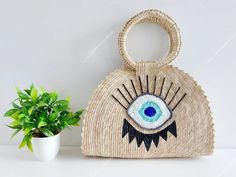 Bohemian Beach Bags For Gifts, Bohemian Multicolor Straw Crochet Bag, Multicolor Bohemian Straw Crochet Bag, Bohemian Beach Bag For Beach Season Gift, Handmade Bags For Beach Season Gifts, White Bohemian Beach Bag For Gift, White Bohemian Beach Bag As Gift, Handmade Straw Handheld Beach Bag, Handmade Blue Jute Straw Bag