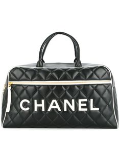 Gabrielle Bonheur Chanel's timeless pieces never go out of style. A Chanel Pre-Owned item is sure to add a little Parisian sophistication to your look. Crafted in France from black and white leather, this quilted luggage handbag features round top handles, a top zip fastening, a front zip pocket, a main internal compartment, an internal zipped pocket, gold-tone hardware, a diamond quilted finish and a front centre logo stamp. Please note that pre-owned items are not new and therefore might have Chanel Suitcase, Suitcase White, Chanel Luggage, Chanel Wedding, Chanel Heels, Chanel Lover, Chanel Black And White, Vintage Chanel Bag, Luxury Bags Collection