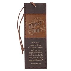 a bookmark with the words man of god on it and a brown leather strap